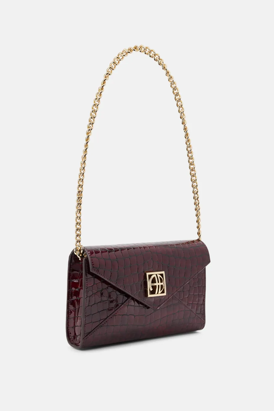 Elly Logo Embossed Mini Clutch Bag in Burgundy